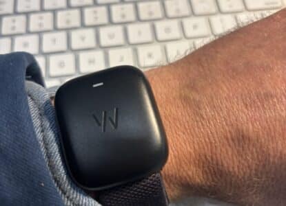 Charging my whoop strap at my desk.